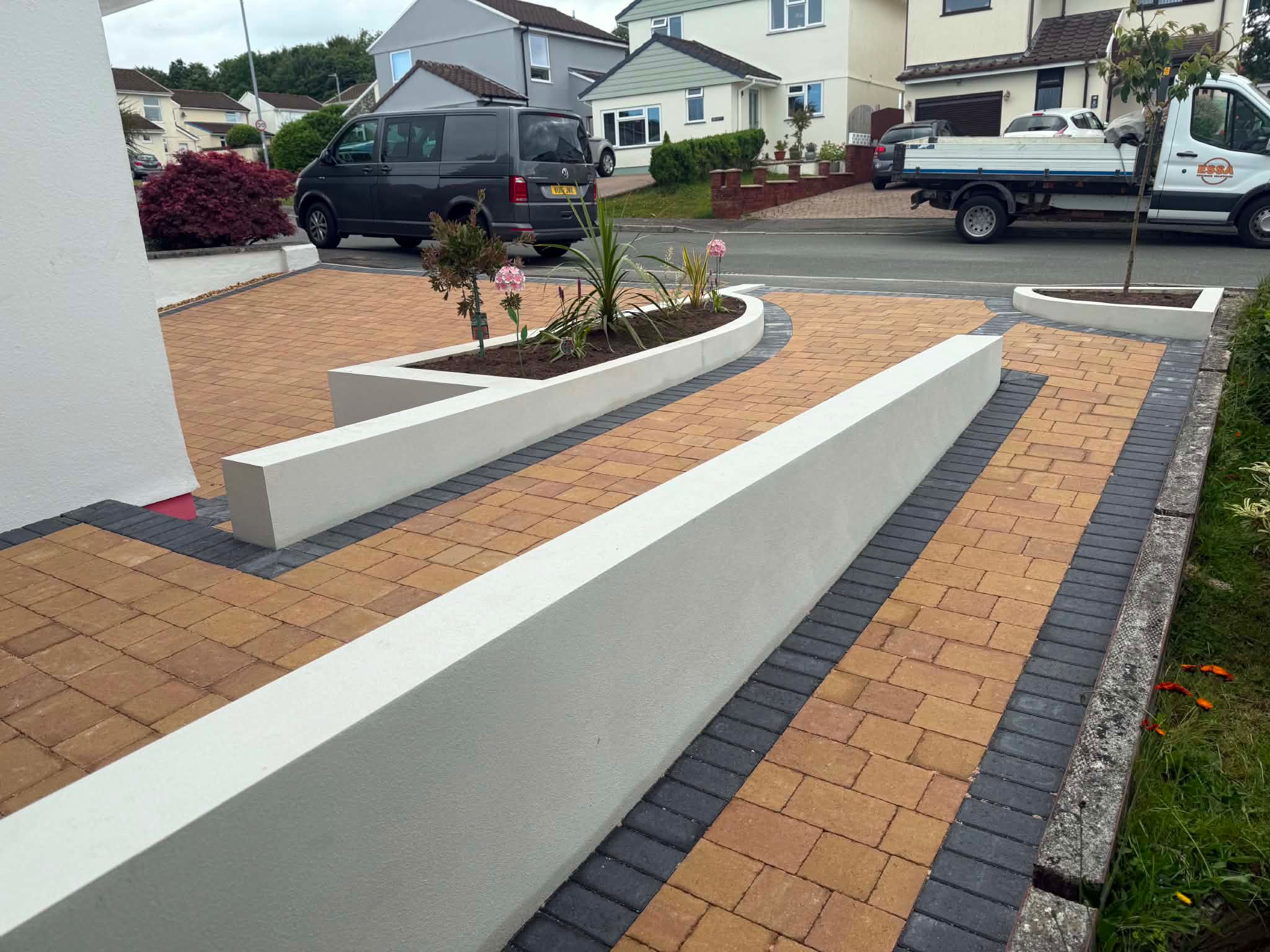 Marshalls Drivesett Tegula block paving driveway installation with charcoal border by ESSA Building Solutions