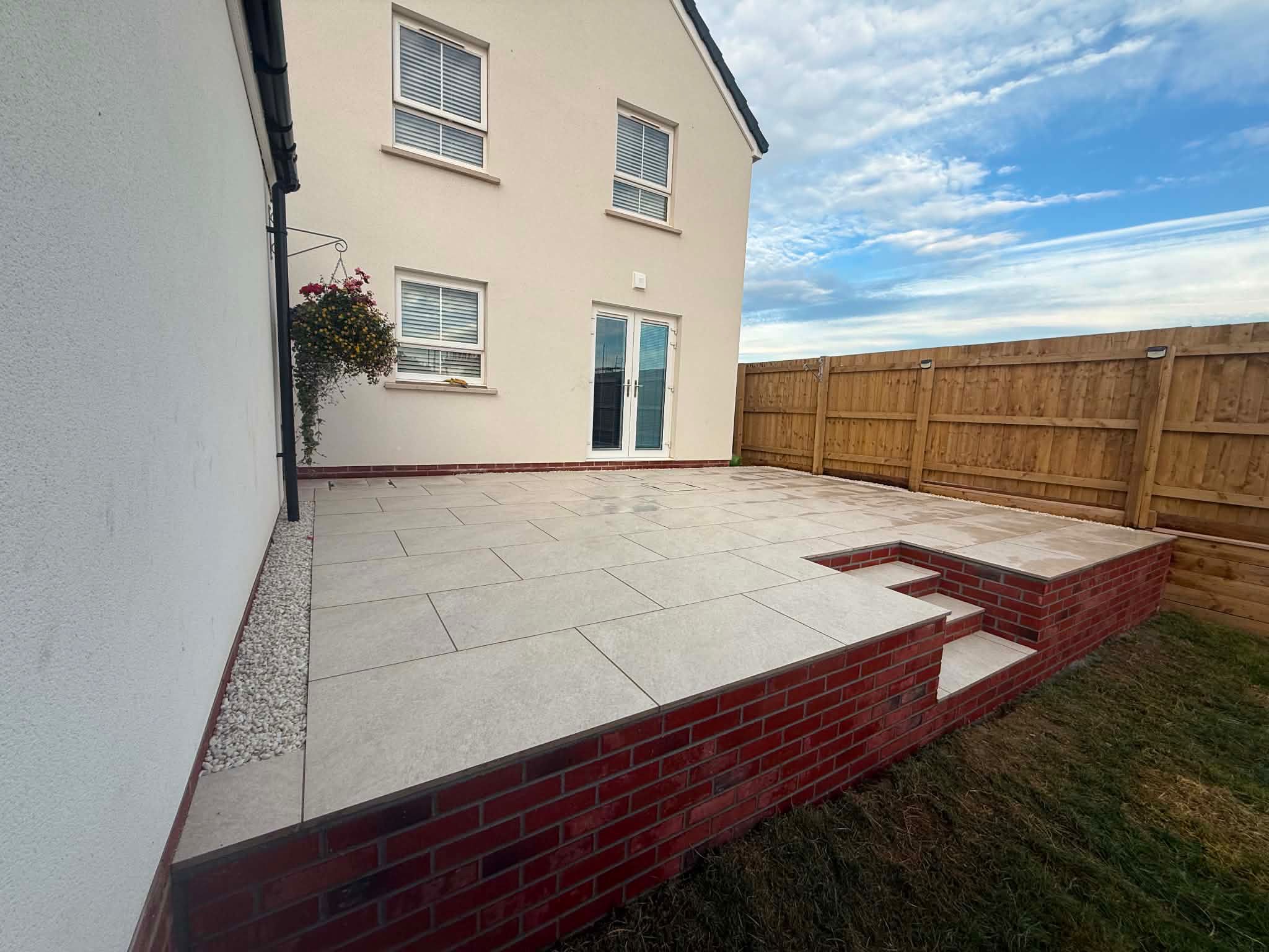 Patio excavation before porcelain paving installation by ESSA Building Solutions